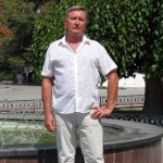 евгений комович